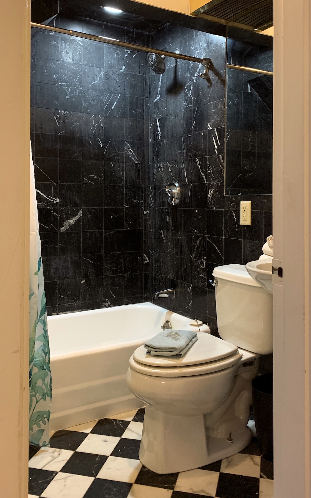 Airbnb Backbay Boston - Black Marble tile bathroom - dark bathrooms - photo - LBI