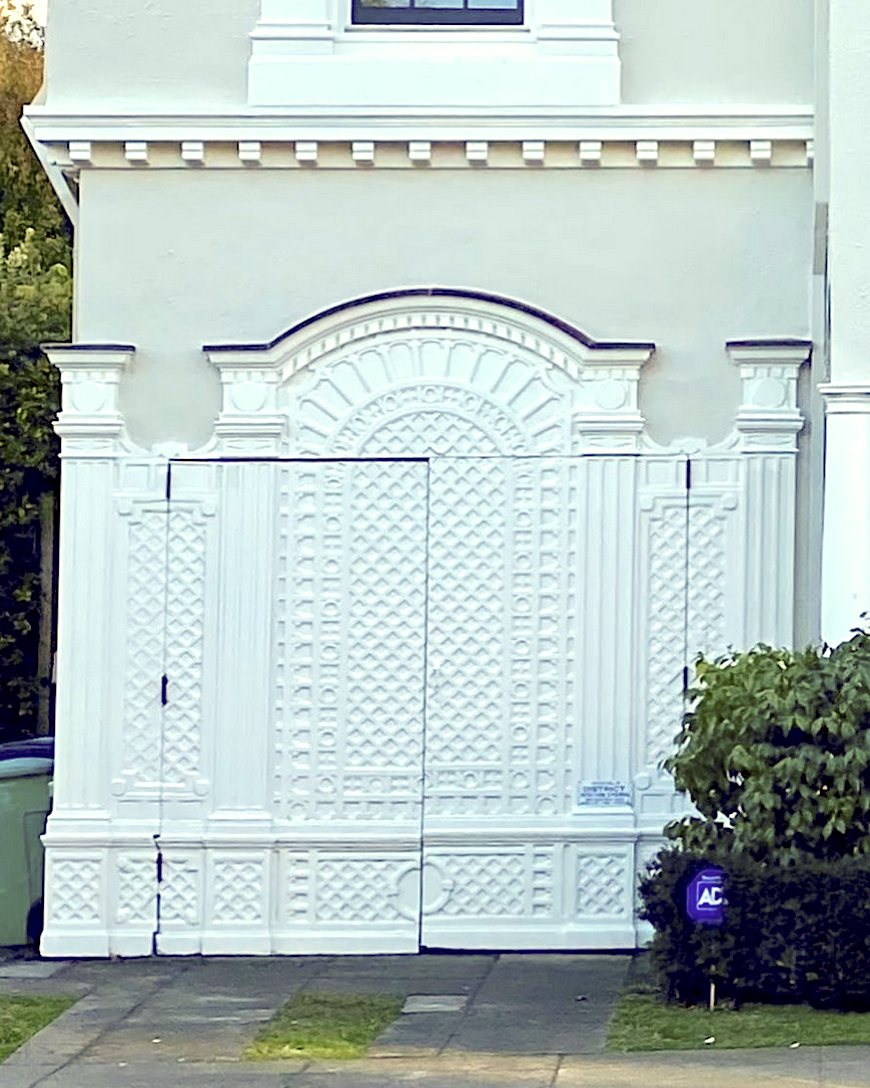 via @thedevotedclassicist instagram - spectacular garage door with lattice design
