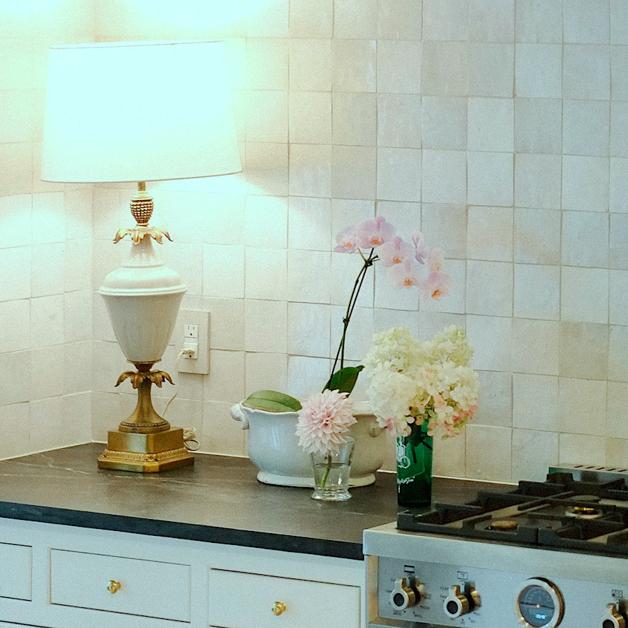 Kitchen makeover vignette Zellige tile - vintage Stiffel lamp