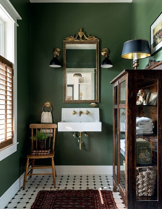Mélanie Cherrier of Blanc Marine Living - dark green bathroom via Canadian House & Home