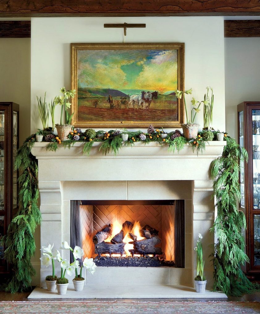 fresh cedar garland-photo: Erica George Dines via Southern Living - Christmas Decorating fireplace mantel