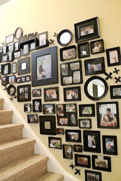 crowded wall-pictures-black frames.png