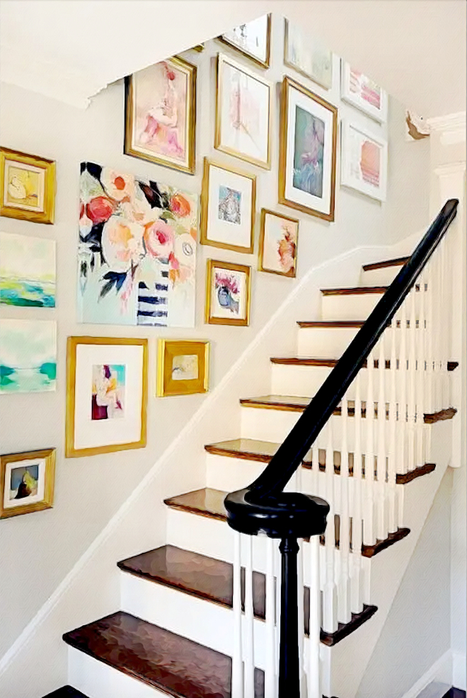 well-done staircase gallery art wall