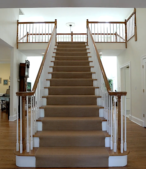 stairs flowing into front door difficult floor plan close up