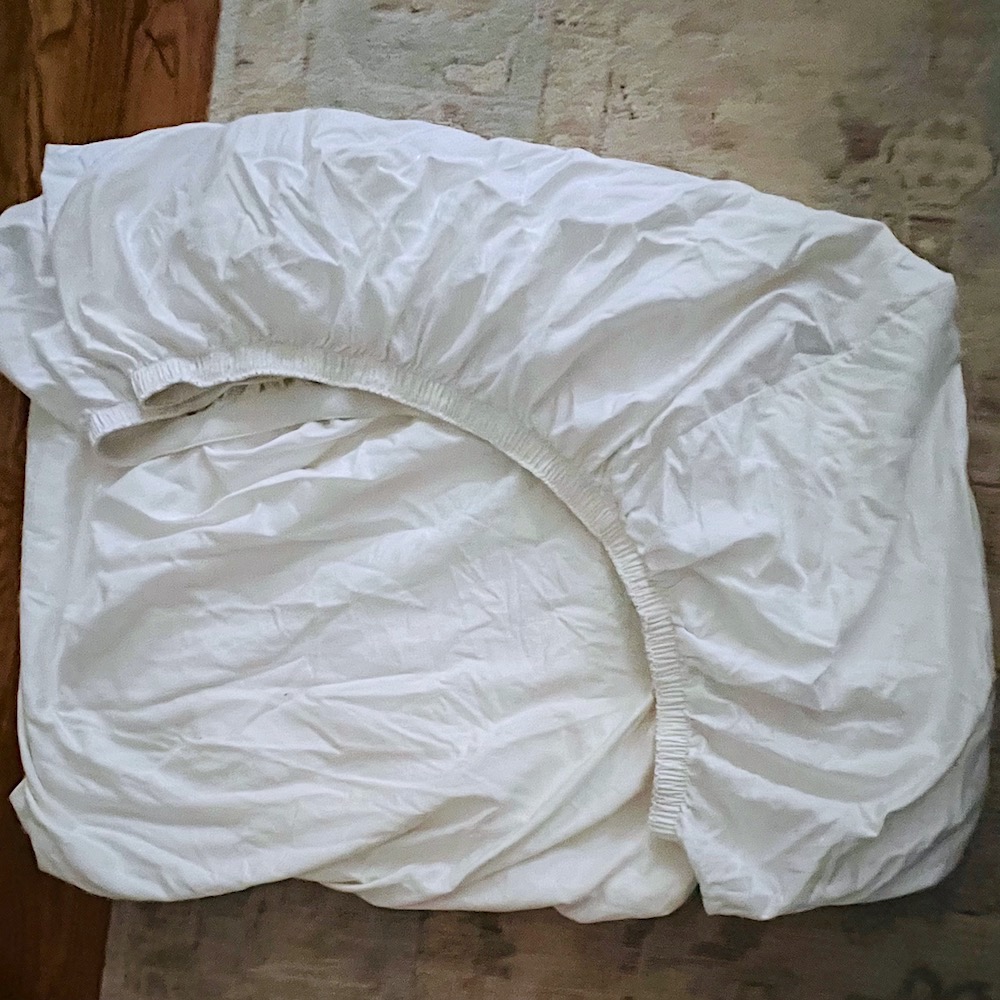 My fitted sheet partially folded