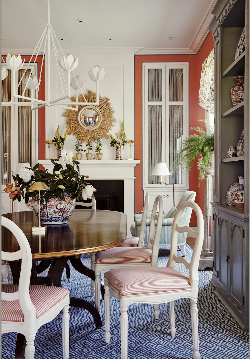 Mark D. Sikes - beautiful coral paint color in this dining room. Photo by Amy Neunsinger