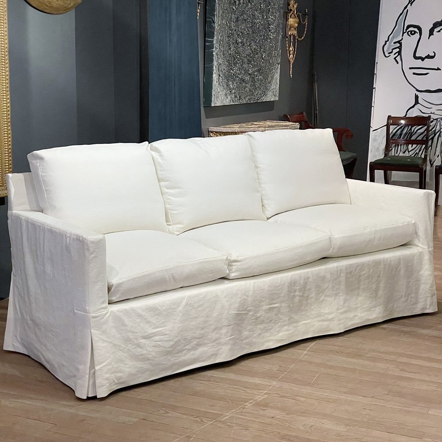 Gerald Bland - white slipcovered sofa