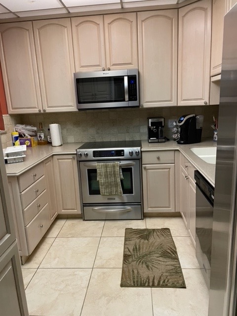 dated kitchen in a frumpy condo in Florida 