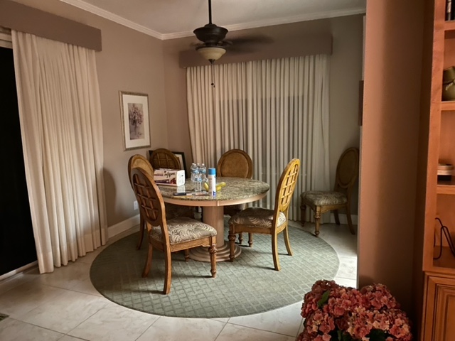 dated condo in Florida with inherited furniture - dining area