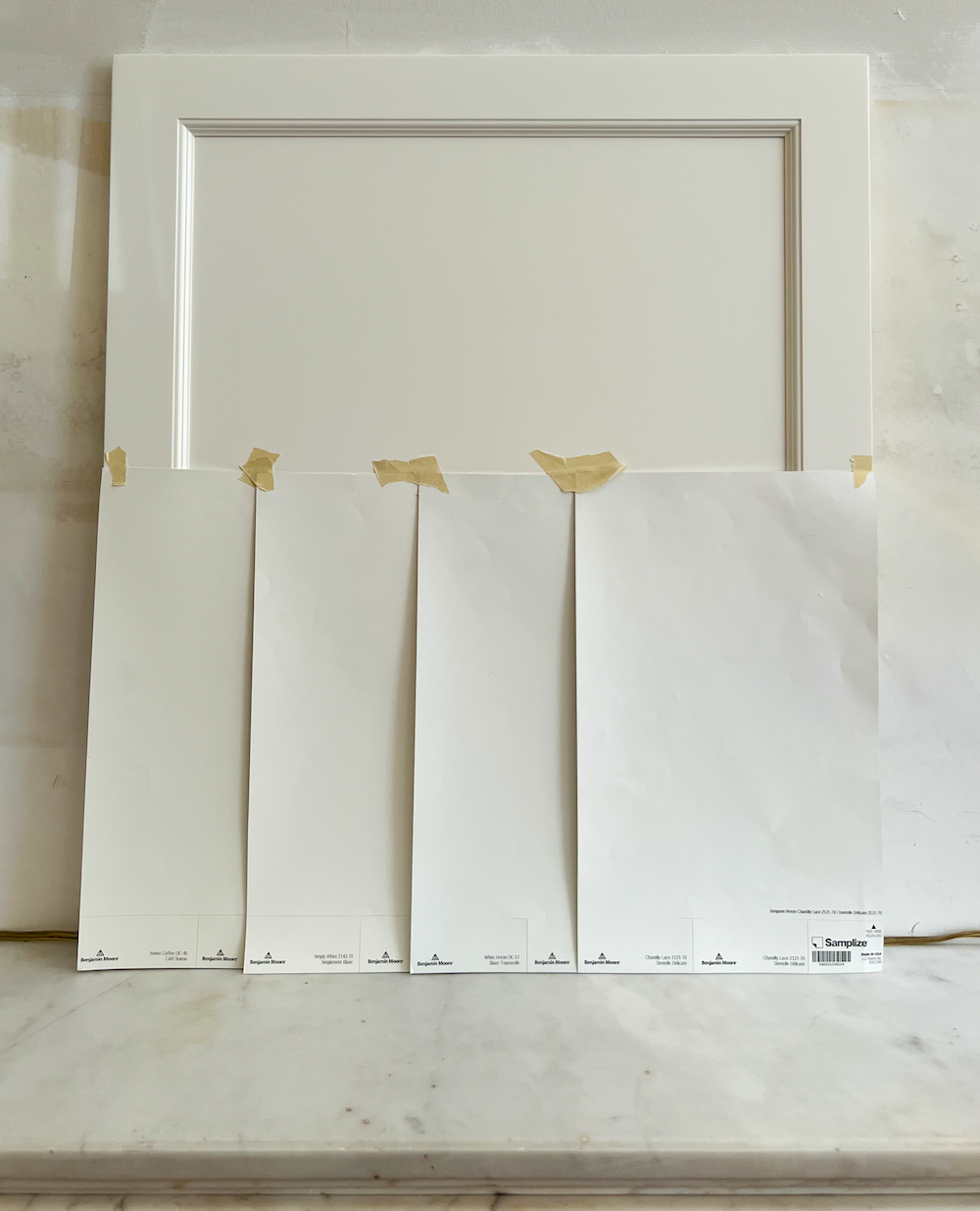 selecting paint colors - Sherwin Williams Greek Villa door with colors from Benjamin Moore - Swiss Coffee, Simply White, White Heron, and Chantilly Lace