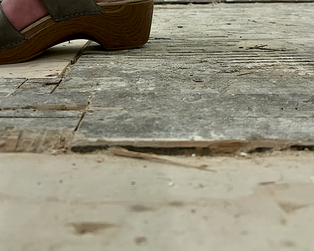 ridiculously uneven bathroom subfloor 