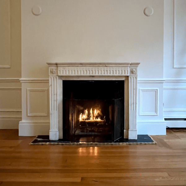 First fire in fireplace antique marble mantel