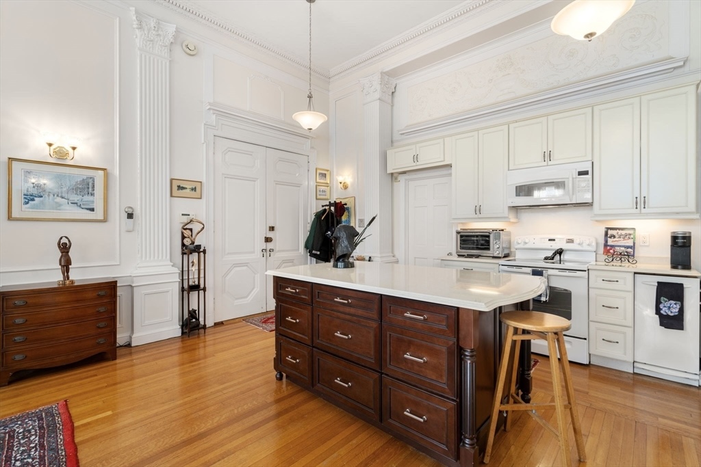 kitchen towards entry & bathroom