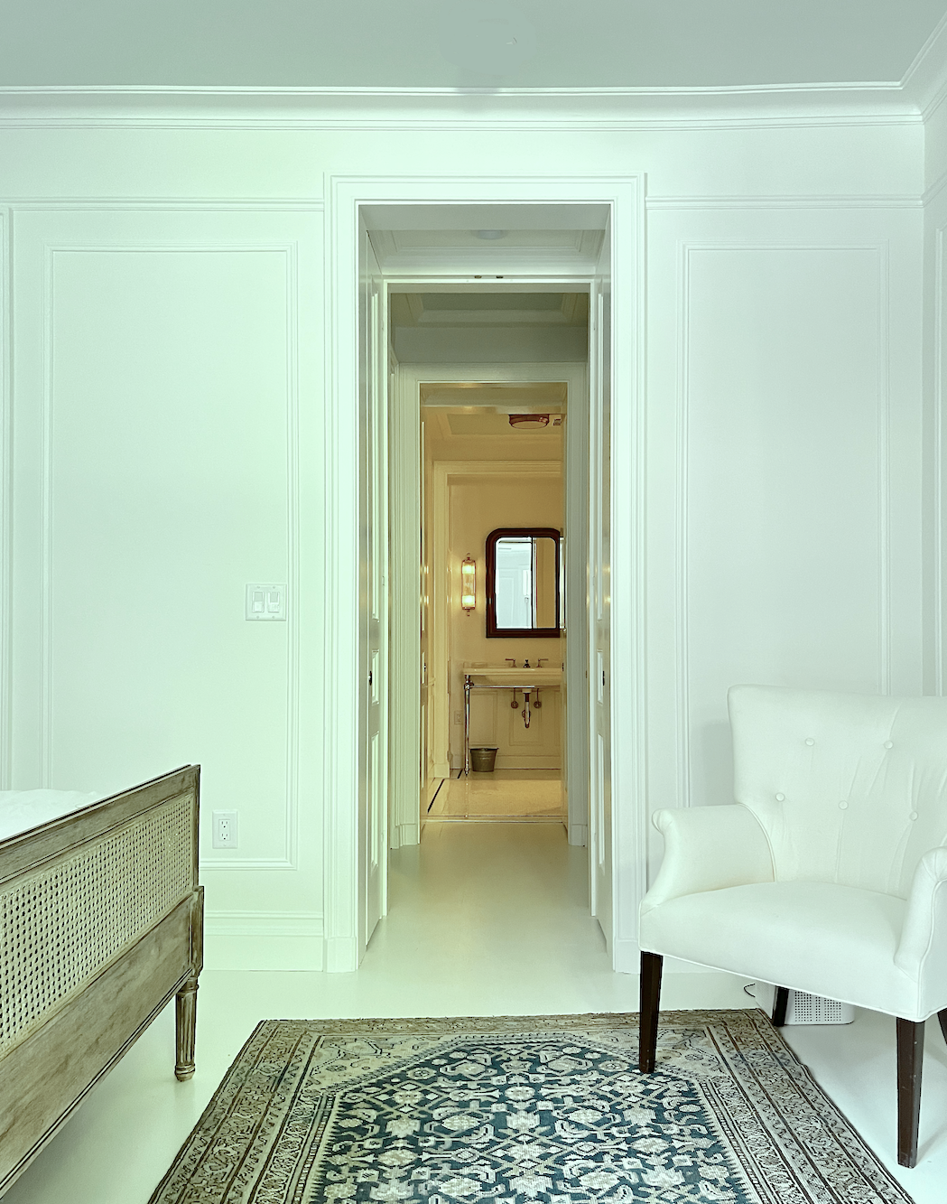 primary bedroom suite looking into bathroom architectural detailing