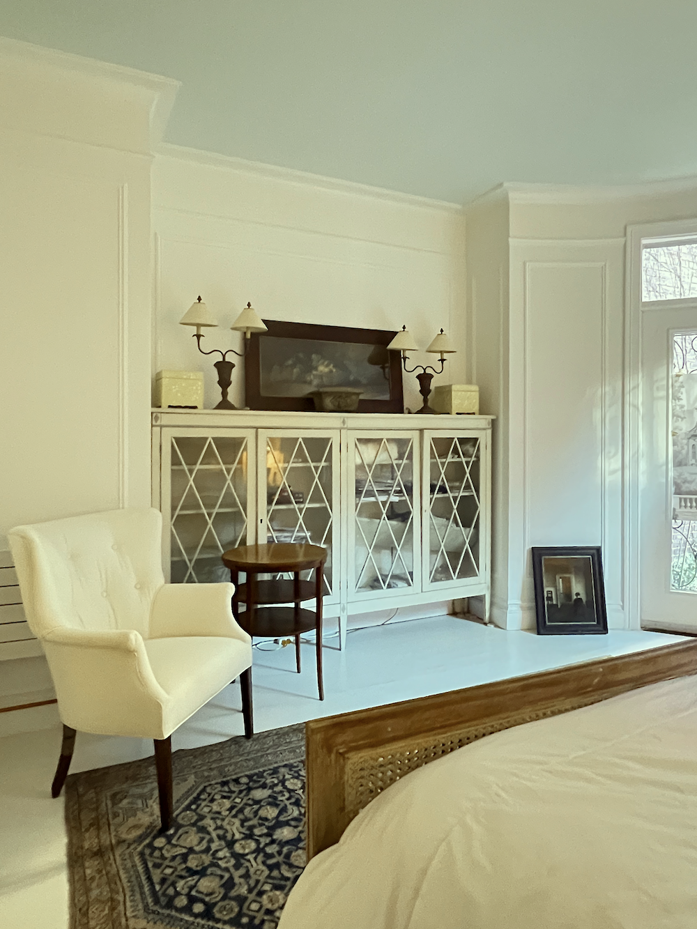 Primary Bedroom - Benjamin Moore Cotton Balls Walls - prized antique Chippendale-style painted bookcase
